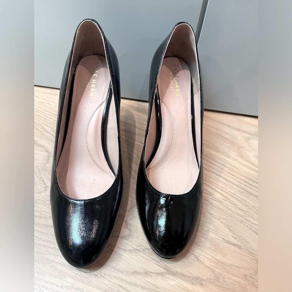 Cole Haan black patent pumps